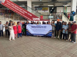 Pedagang Pasar Induk Among Tani Zona Apel Batu Malang Mendukung Pertumbuhan Ekonomi Nasional Jawa Timur